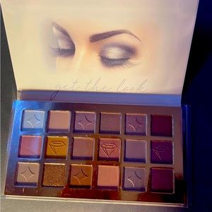 Eyeshadow palette and makeup brushes